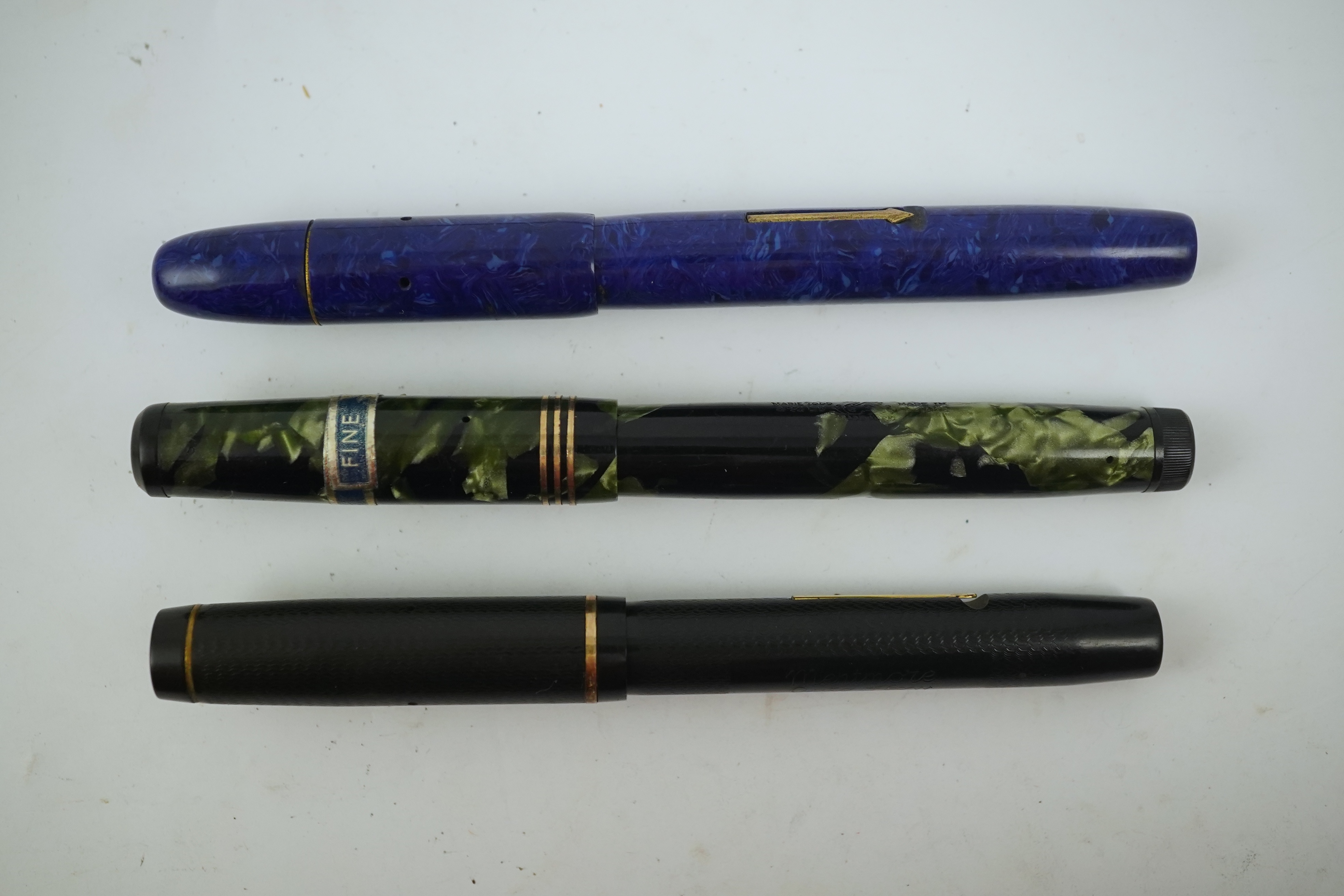 A Wyvern Perfect, No. 81, a Mentmore Autoflow fountain pen and a Mabie Todd Swan fountain pen. Condition - fair to good